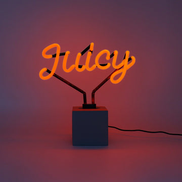 Cartello "Juicy" al neon
