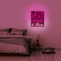 Neon rosa a LED montabile a parete 'Rimaniamo a casa e scopiamo'.