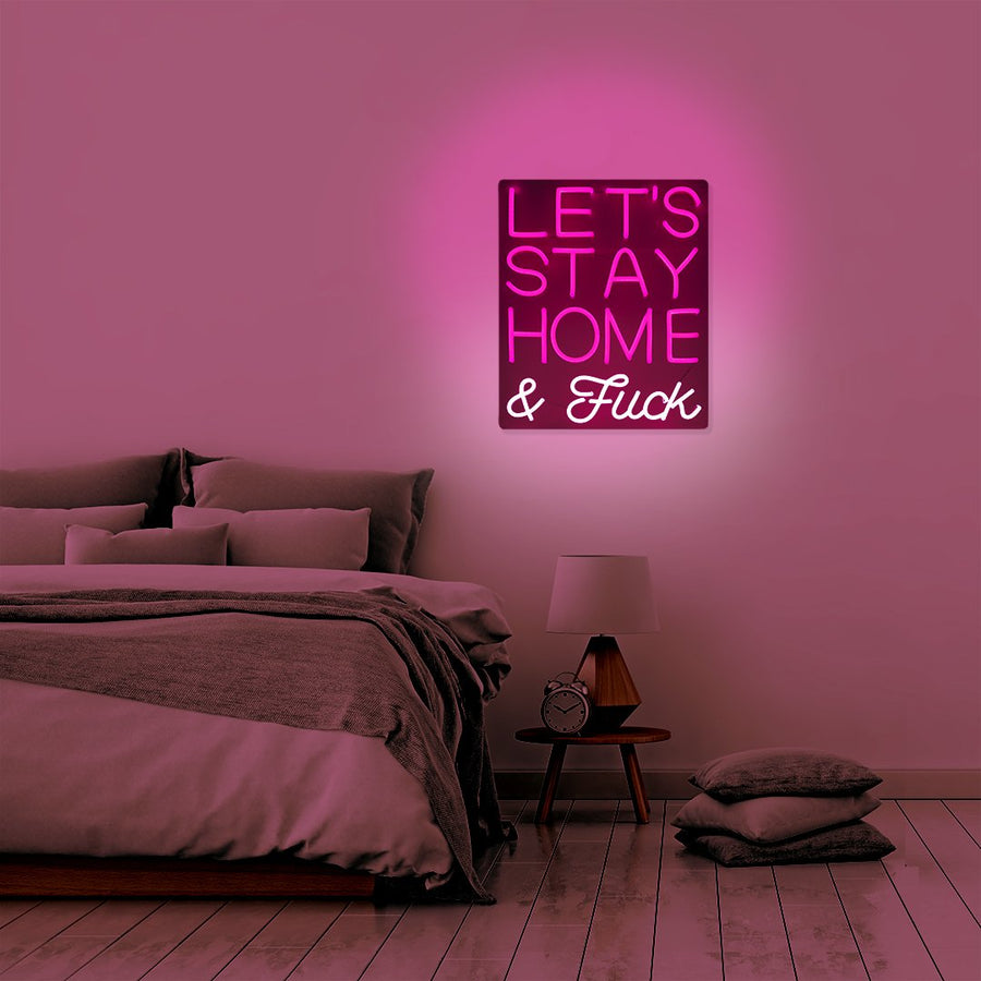 Neon rosa a LED montabile a parete 'Rimaniamo a casa e scopiamo'.